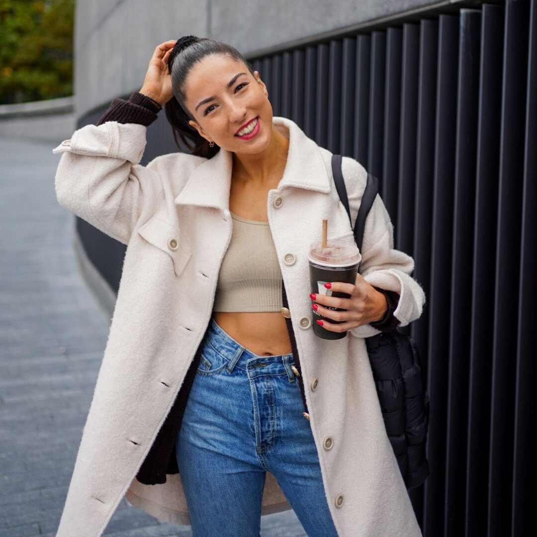 Ana Dima smiling outdoors